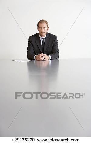 Businessman Sitting in Conference Room View Large Photo Image Stock Image - Businessman Sitting in Conference Room. Fotosearch