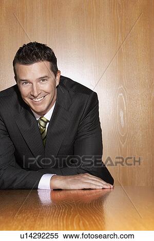 Stock Photography - Businessman smiling portrait. Fotosearch