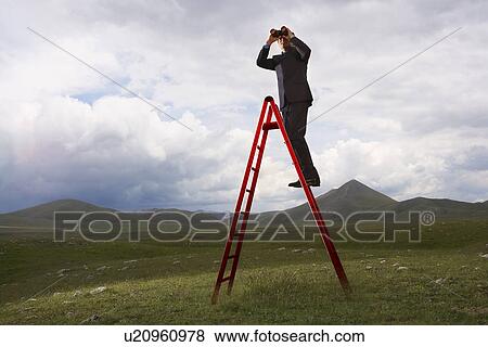 Businessman with Binoculars on Ladder View Large Photo Image Stock Photo - Businessman with Binoculars on Ladder. Fotosearch