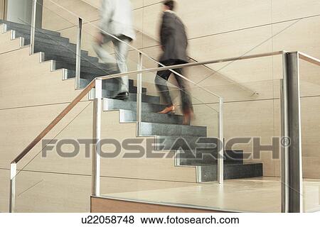 Stock Photo - Businessmen Climbing Stairs. Fotosearch