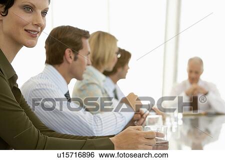 Businesspeople in conference meeting View Large Photo Image Stock Photograph - Businesspeople in conference meeting. Fotosearch