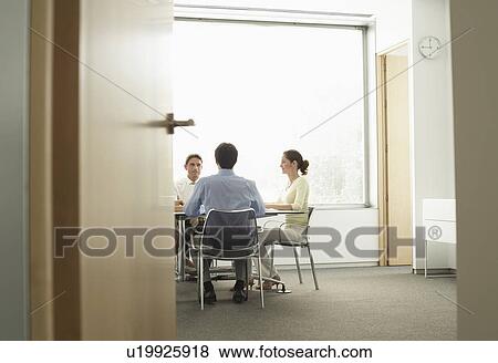 Stock Photo - Businesspeople in Meeting. Fotosearch