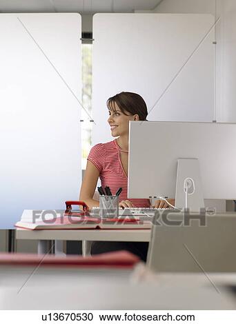 Businesswoman at desk half length View Large Photo Image Stock Image - Businesswoman at desk half length. Fotosearch