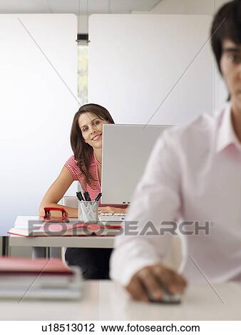 Businesswoman at desk half length View Large Photo Image Stock Image - Businesswoman at desk half length. Fotosearch