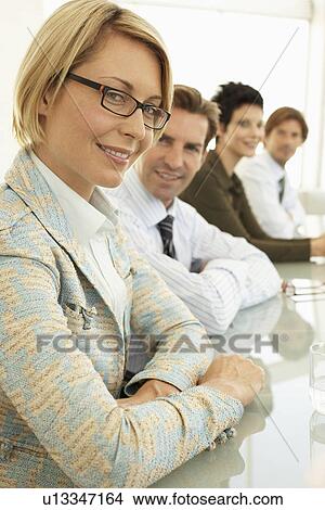 Businesswoman in conference meeting portrait View Large Photo Image Picture - Businesswoman in conference meeting portrait. Fotosearch