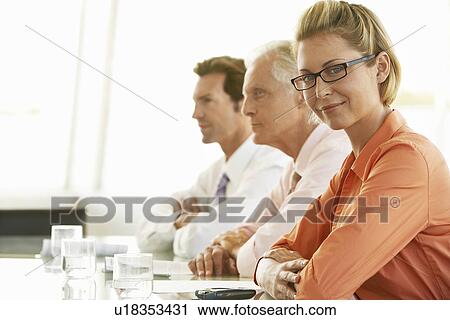 Stock Image - Businesswoman in conference meeting portrait. Fotosearch
