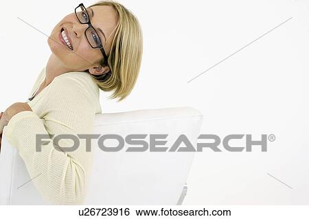 Businesswoman smiling on white background portrait View Large Photo Image Stock Photograph - Businesswoman smiling on white background portrait. Fotosearch