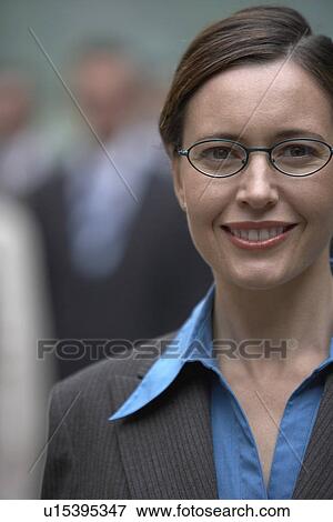 Stock Photo - Businesswoman smiling portrait. Fotosearch