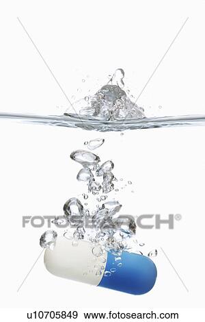 Stock Photo - Capsule in Water. Fotosearch