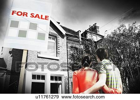 Couple in Front of New Home View Large Photo Image Stock Photo - Couple in Front of New Home. Fotosearch