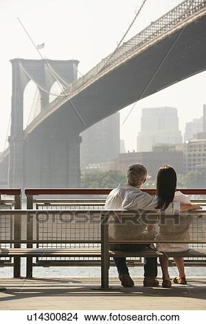 Couple Looking at Bridge View Large Photo Image Picture - Couple Looking at Bridge. Fotosearch