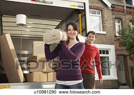Couple Moving into New Home View Large Photo Image Stock Image - Couple Moving into New Home. Fotosearch