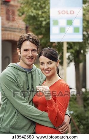 Couple Moving into New Home View Large Photo Image Stock Image - Couple Moving into New Home. Fotosearch