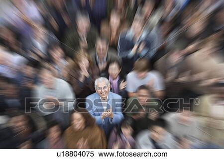 Stock Photography - Crowd of people zoom effect. Fotosearch