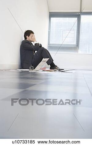 Despaired Businessman Sitting on Floor View Large Photo Image Stock Photography - Despaired Businessman Sitting on Floor. Fotosearch