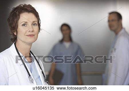 Doctor in Elevator portrait View Large Photo Image Stock Photography - Doctor in Elevator portrait. Fotosearch