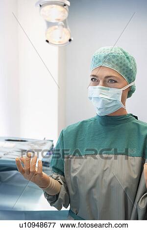 Doctor in operating theatre Ready for Surgery View Large Photo Image Stock Photo - Doctor in operating theatre Ready for Surgery. Fotosearch