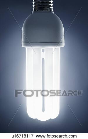Stock Photo - Energy saving lightbulb studio shot. Fotosearch