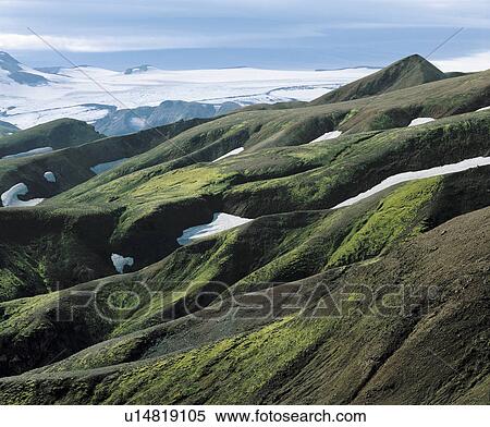Eroded rocky landscape and snowfield View Large Photo Image Stock Photography - Eroded rocky landscape and snowfield. Fotosearch