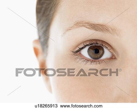 Stock Image - Eye of young woman close up. Fotosearch
