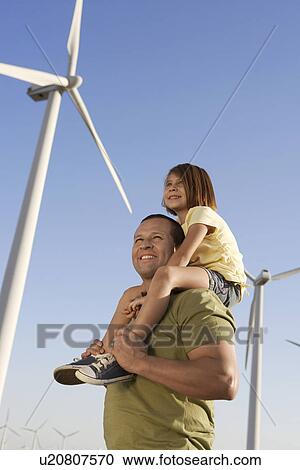 Father and daughter (5-6) on wind farm side view View Large Photo Image Stock Image - Father and daughter (5-6) on wind farm side view. Fotosearch