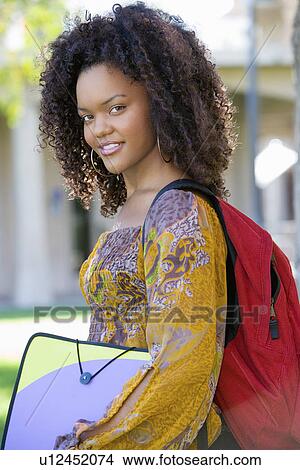 Female student outdoors (portrait) View Large Photo Image Picture - Female student outdoors (portrait). Fotosearch