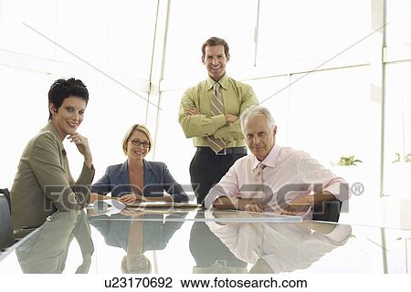 Four Businesspeople in Meeting View Large Photo Image Stock Image - Four Businesspeople in Meeting. Fotosearch