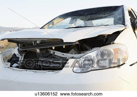 Front end of wrecked car on desert highway View Large Photo Image Stock Image - Front end of wrecked car on desert highway. Fotosearch