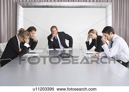 Frustrated Businesspeople Listening to Conference Call View Large Photo Image Stock Photography - Frustrated Businesspeople Listening to Conference Call. Fotosearch