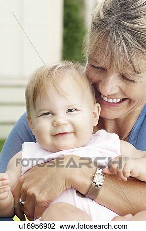 Grandmother and granddaughter close up View Large Photo Image Stock Image - Grandmother and granddaughter close up. Fotosearch