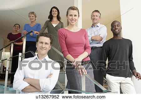 Group of Office Workers Posing on Office Steps portrait View Large Photo Image Stock Image - Group of Office Workers Posing on Office Steps portrait. Fotosearch