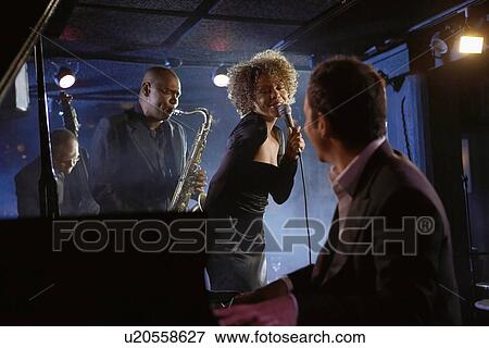 Jazz Musicians Performing in Club View Large Photo Image Stock Photo - Jazz Musicians Performing in Club. Fotosearch