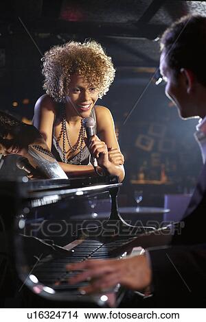 Jazz singer and pianist on stage View Large Photo Image Picture - Jazz singer and pianist on stage. Fotosearch