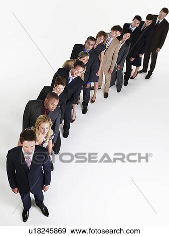 Line of Businesspeople leaning over View Large Photo Image Stock Photo - Line of Businesspeople leaning over. Fotosearch