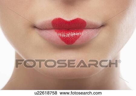 Lips painted with lipstick heart View Large Photo Image Stock Photo - Lips painted with lipstick heart. Fotosearch