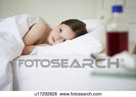 Little Girl in Bed with a Cold portrait View Large Photo Image Stock Photograph - Little Girl in Bed with a Cold portrait. Fotosearch