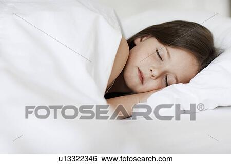 Little Girl Sleeping in bed close up View Large Photo Image Stock Photograph - Little Girl Sleeping in bed close up. Fotosearch