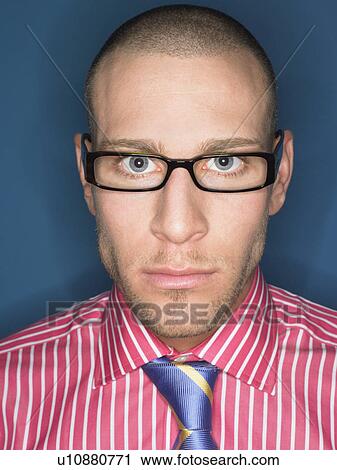 Man in glasses head and shoulders portrait View Large Photo Image Stock Image - Man in glasses head and shoulders portrait. Fotosearch