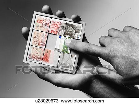 Man solving economic puzzle View Large Photo Image Stock Image - Man solving economic puzzle. Fotosearch