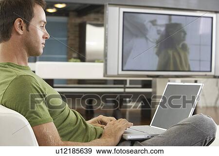 Man Using Laptop View Large Photo Image Stock Photo - Man Using Laptop. Fotosearch