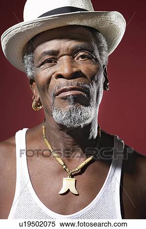 Man Wearing Fedora and medallion View Large Photo Image Stock Photography - Man Wearing Fedora and medallion. Fotosearch