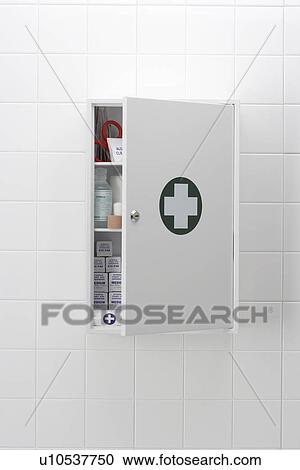 Stock Image - Medical cabinet on wall. Fotosearch