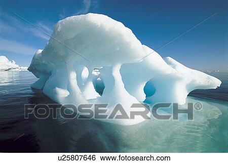 Melting iceberg and water View Large Photo Image Stock Photograph - Melting iceberg and water. Fotosearch