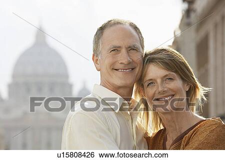 Middle-aged couple hugging in Rome Italy front view portrait View Large Photo Image Stock Photograph - Middle-aged couple hugging in Rome Italy front view portrait. Fotosearch