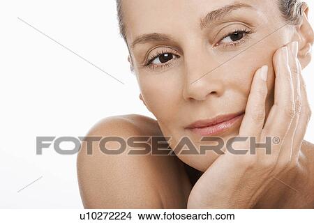 Middle-Aged Woman hand on chin View Large Photo Image Picture - Middle-Aged Woman hand on chin. Fotosearch