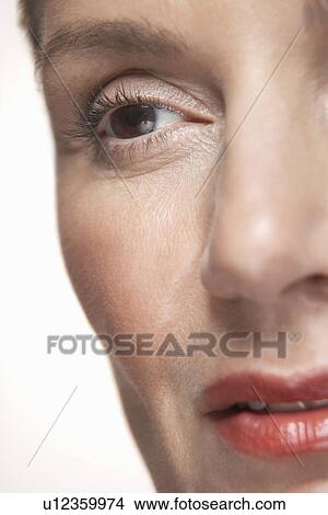 Middle-aged woman's face cropped View Large Photo Image Picture - Middle-aged woman's face cropped. Fotosearch