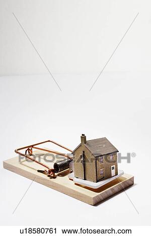 Model house as bait on mousetrap View Large Photo Image Stock Image - Model house as bait on mousetrap. Fotosearch