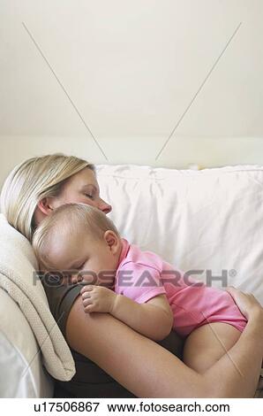 Mother and Baby Sleeping on Sofa View Large Photo Image Stock Photo - Mother and Baby Sleeping on Sofa. Fotosearch