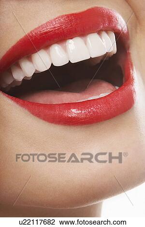 Mouth with red lipstick laughing View Large Photo Image Stock Image - Mouth with red lipstick laughing. Fotosearch