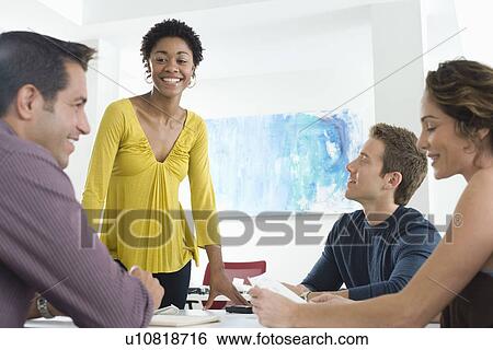Office workers having conference View Large Photo Image Stock Photograph - Office workers having conference. Fotosearch